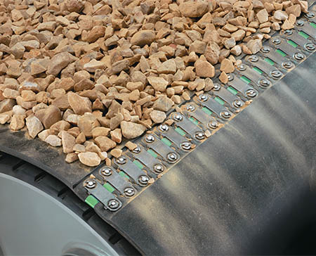 BoltSolidPlateOnPulleyRocks Flexco® Bolt Solid Plate Fastening System